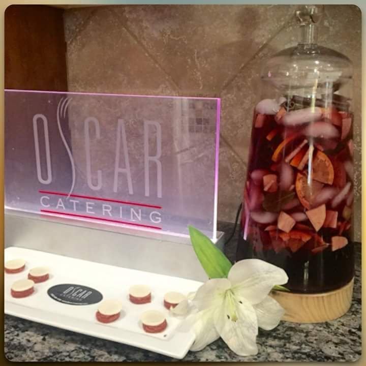 Canap&eacute;s plated beside a sangria dispenser