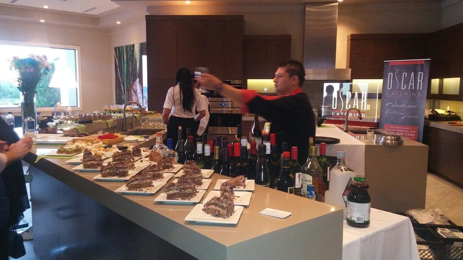 Dessert and beverage service on a kitchen island at a private residence